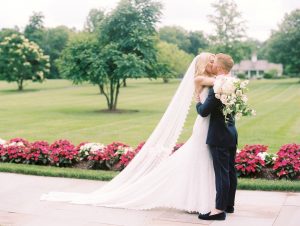 bride and groom kissing