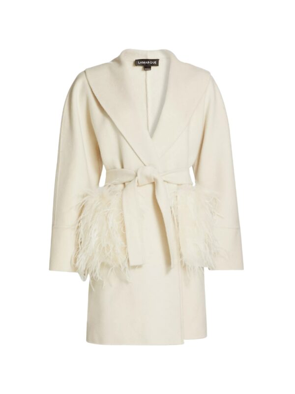 white coat with fringe pockets