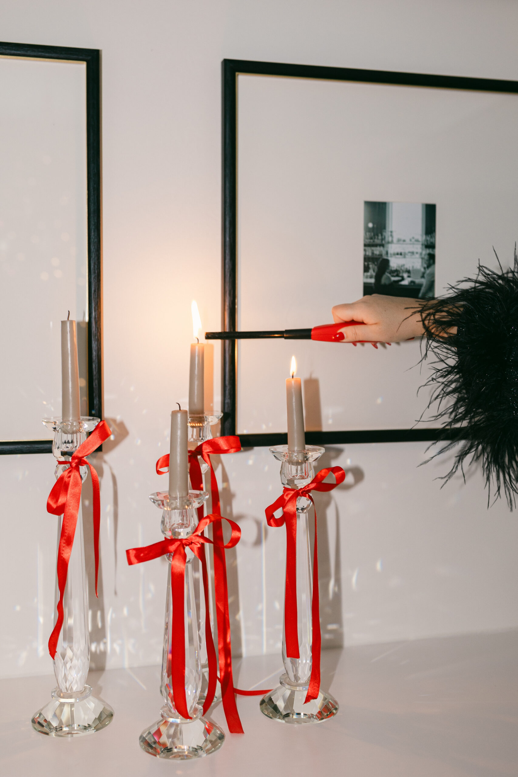 taper candles with red bows