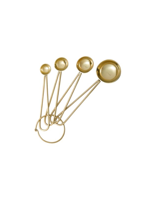 gold measuring spoons