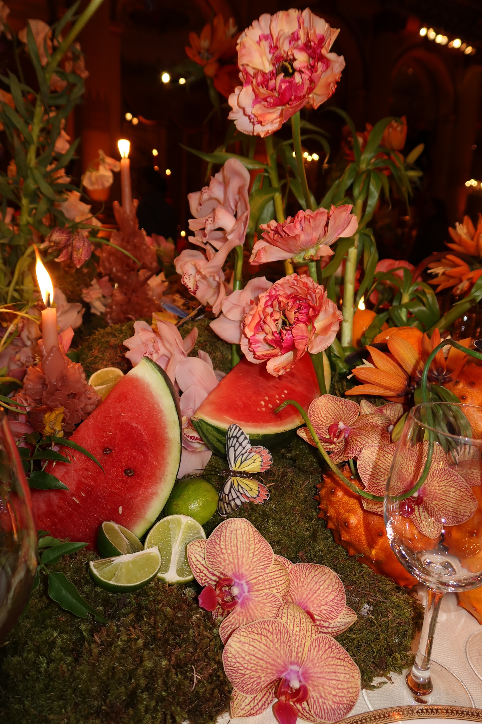 Mexican modern centerpiece with orchids and fruit