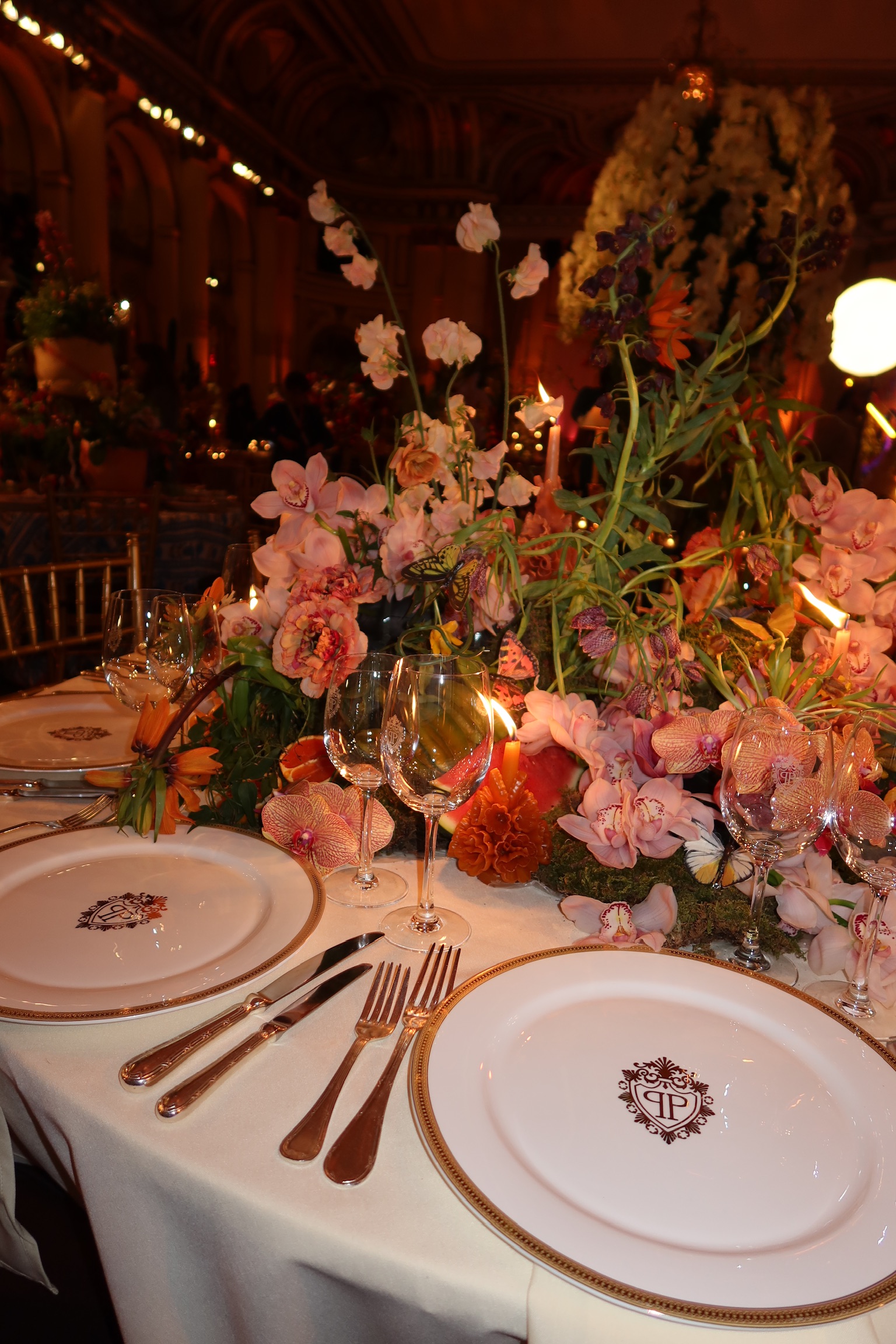 Mexican modern centerpiece with orchids and fruit