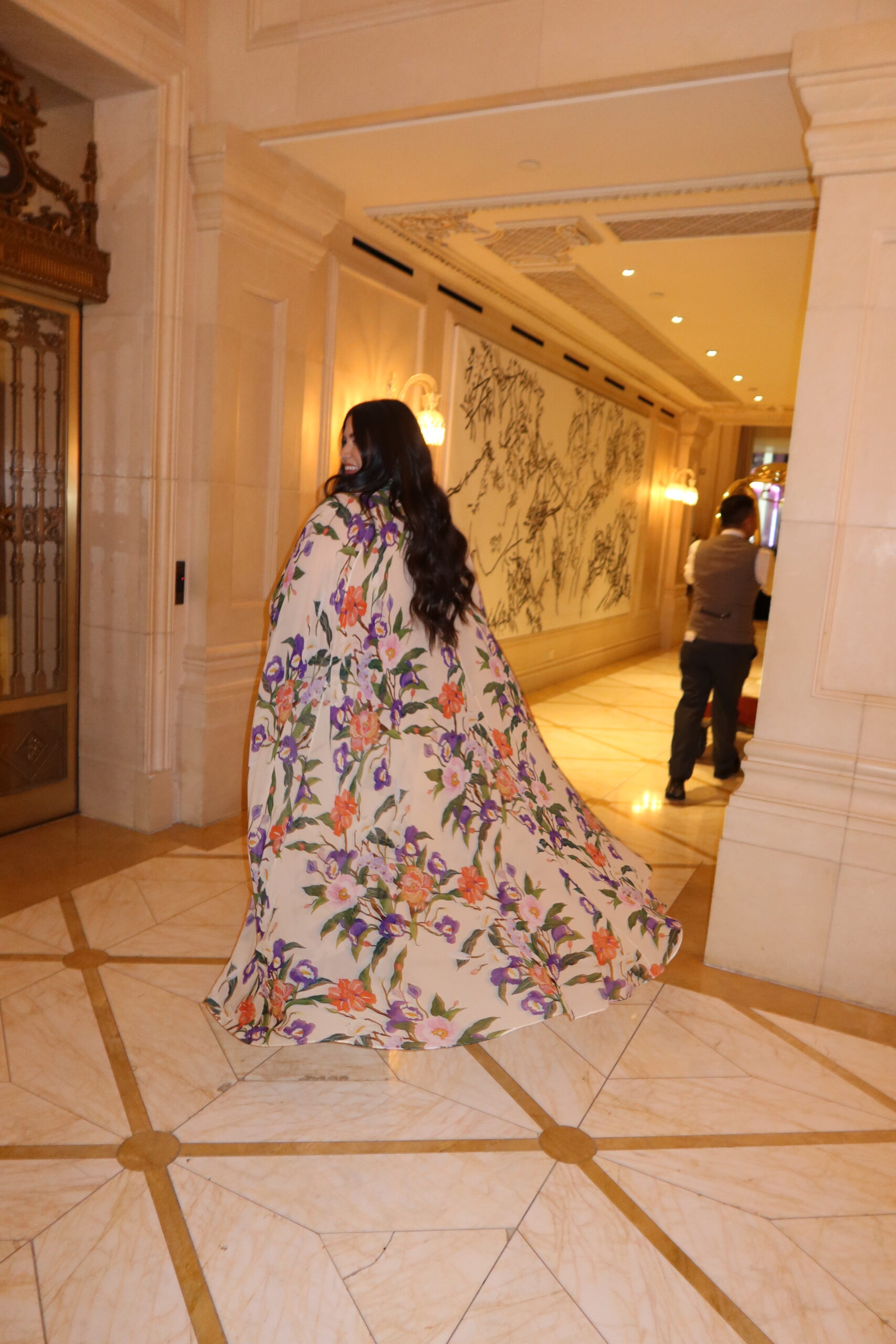 Designer floral cape at New York Botanical Garden Orchid Dinner 2025